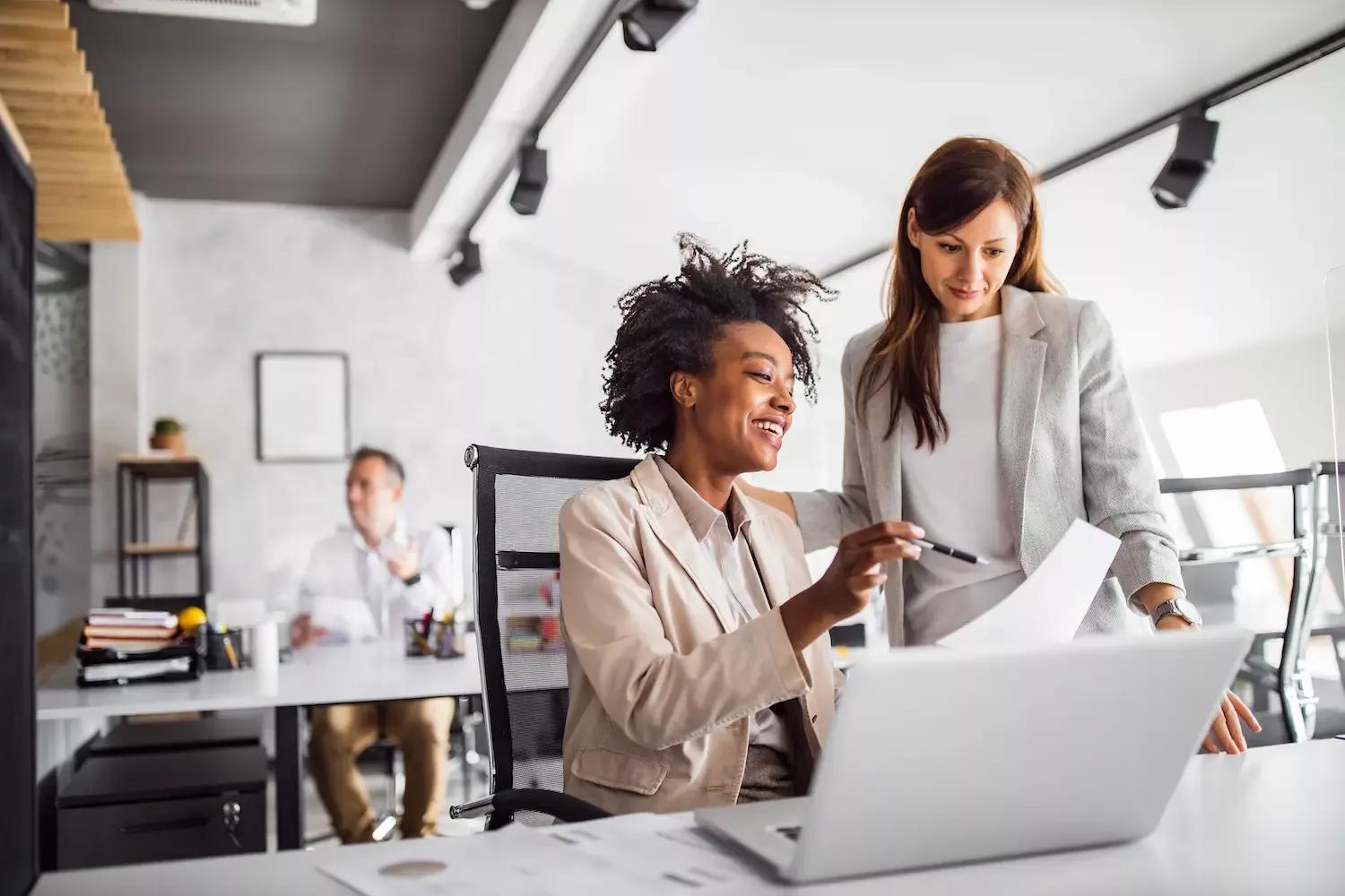 Image of a CIO and IT team working together