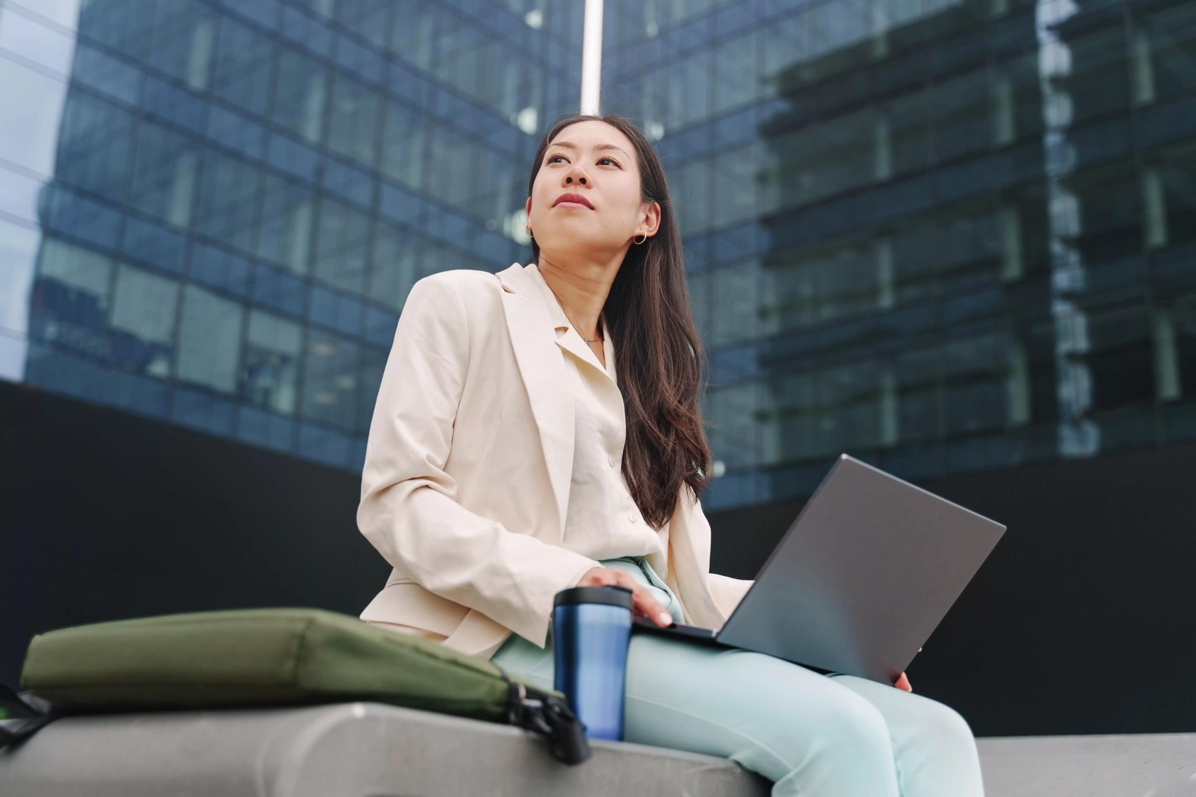 Image of a treasury manager working outside of the office