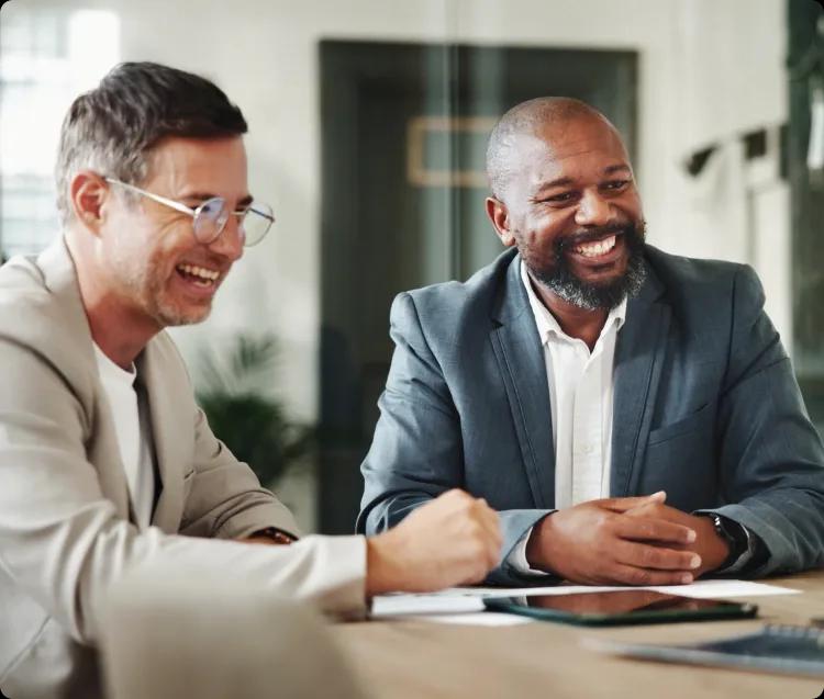 Image of a treasury team working happily together after purchasing Kyriba's TAI product