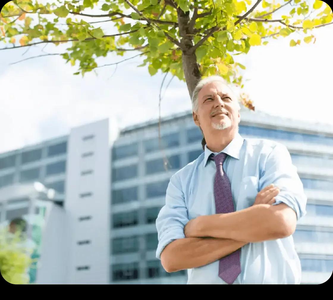 Image of a public sector treasurer who uses Kyriba's payment hub to centralize payment workflows while adding key capabilities like sanctions list screening and real-time fraud detection