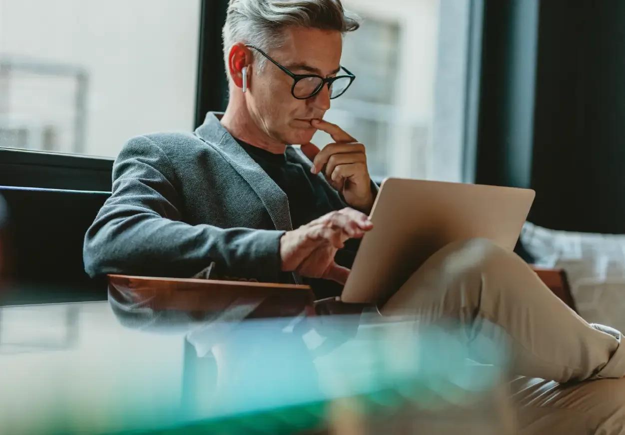 Image of a finance leader working on his laptop