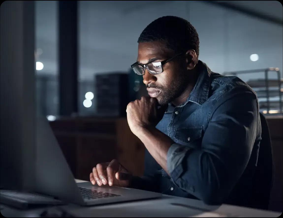 Image of a treasury leader working on his laptop