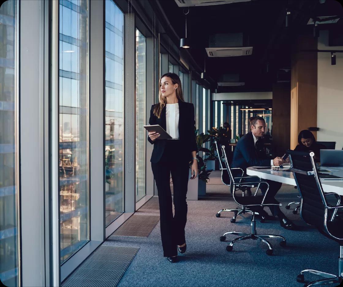 Image of a treasury leader using Kyriba to get real-time liquidity insights for her real estate company