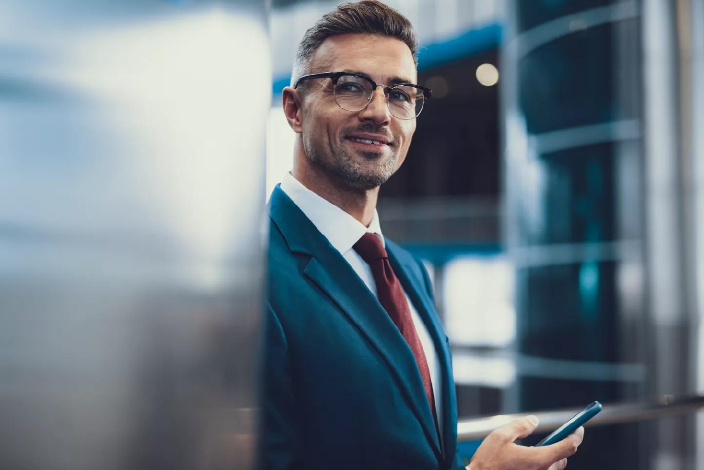 Image of a CFO working from his phone