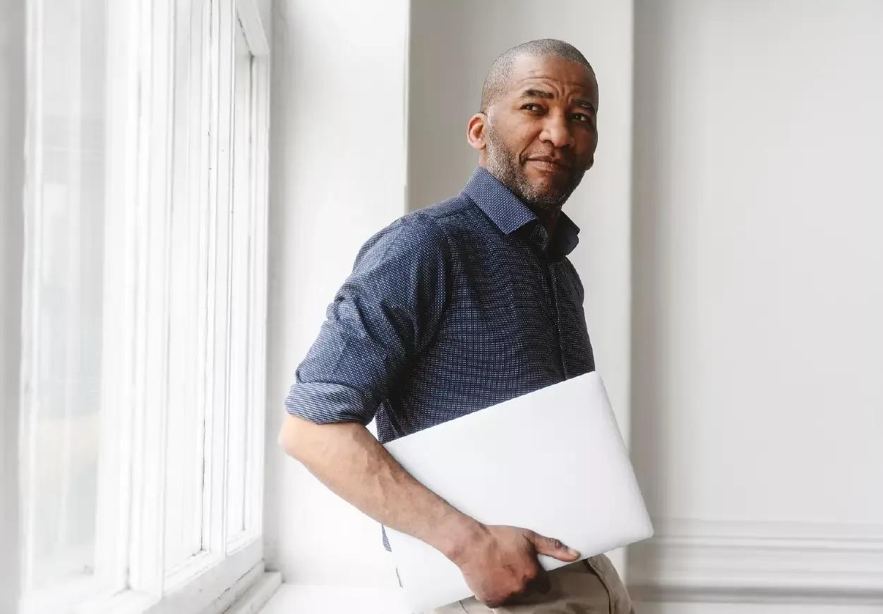 Image of treasury employee with his laptop