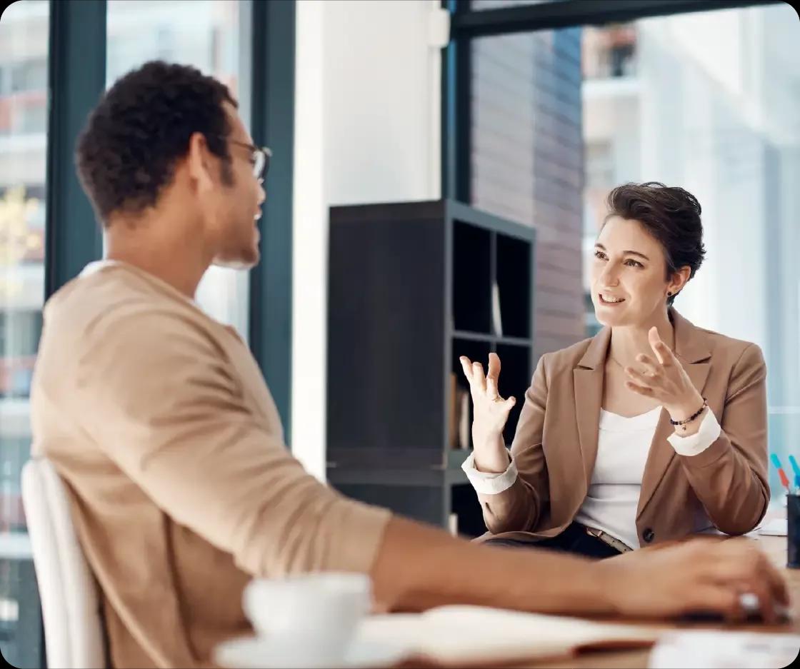 Image of two finance leaders having a meeting together