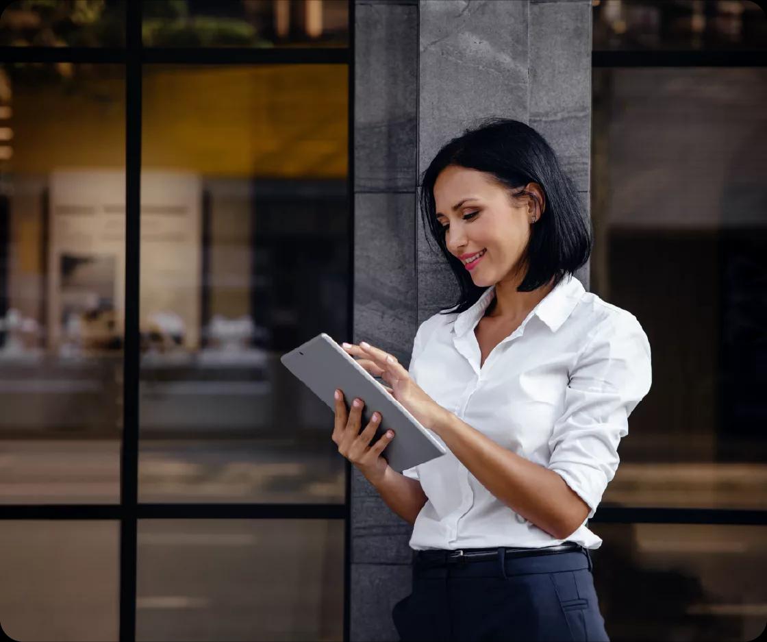 Image of a CFO working on her tablet