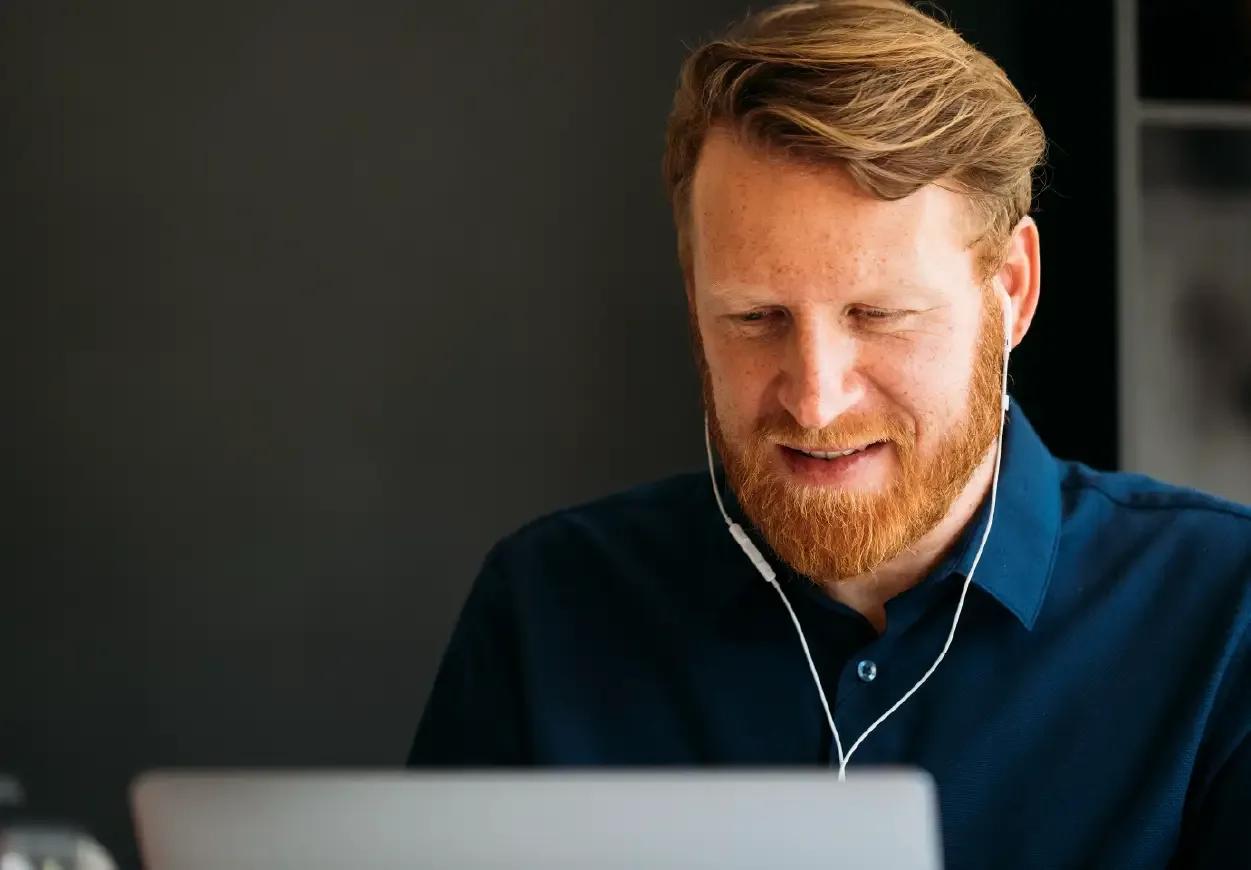 Image of a CFO working on his laptop